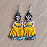 handmade mexican earrings, chaquira beads, yellow dolls