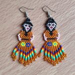 handmade mexican earrings, chaquira beads, golden dolls